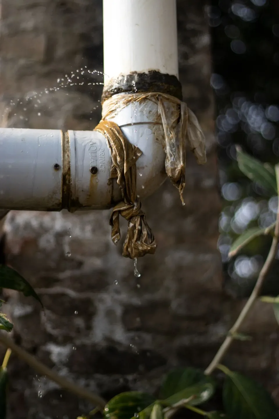Pvc Pipe — Plumbing Repair — Pvc Pipe, Pipe Elbow Joint, Leaking Water Droplets, Plumbing Repair, Plumbing